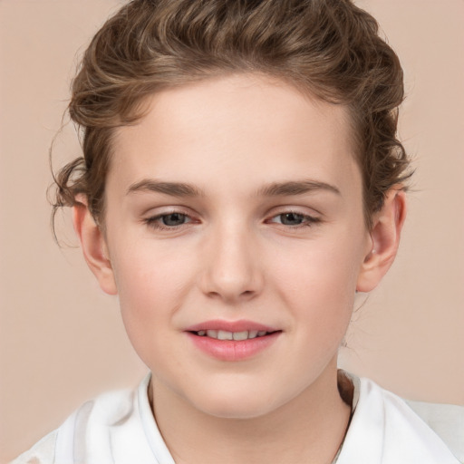 Joyful white child female with short  brown hair and brown eyes