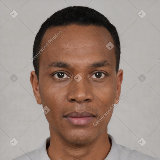 Neutral black young-adult male with short  black hair and brown eyes