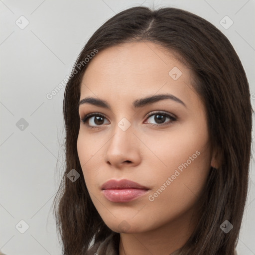 Neutral white young-adult female with long  brown hair and brown eyes