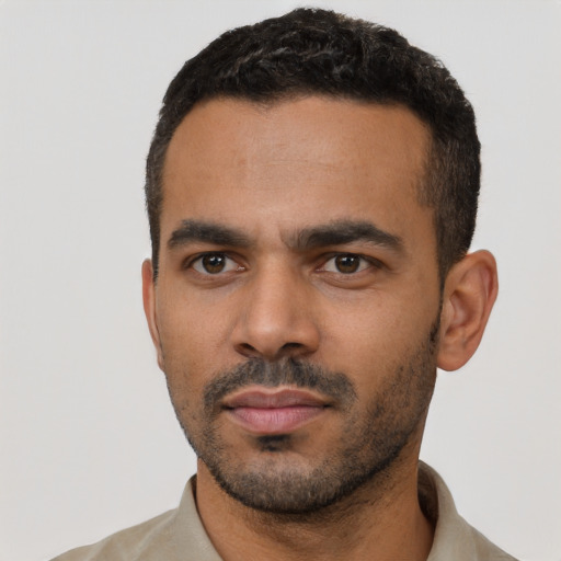 Neutral black young-adult male with short  black hair and brown eyes
