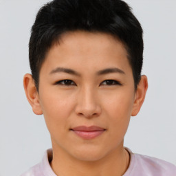 Joyful asian young-adult female with short  brown hair and brown eyes