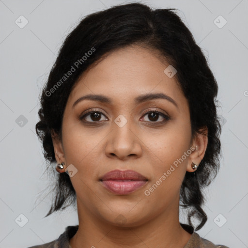 Joyful latino young-adult female with long  black hair and brown eyes