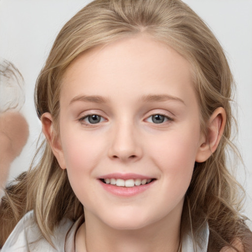 Joyful white child female with medium  brown hair and blue eyes