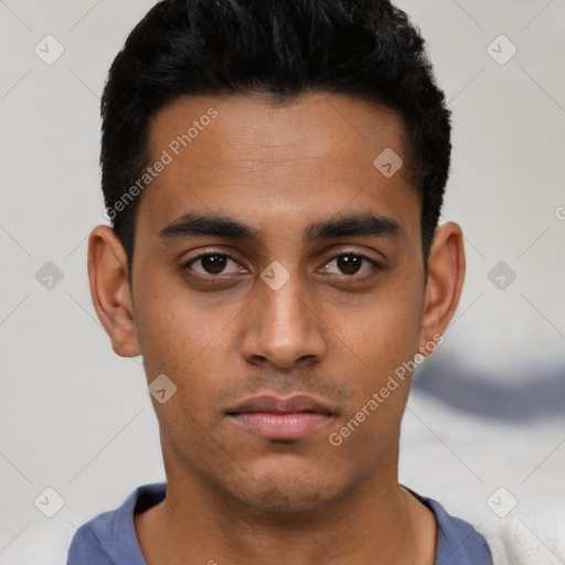 Neutral latino young-adult male with short  black hair and brown eyes