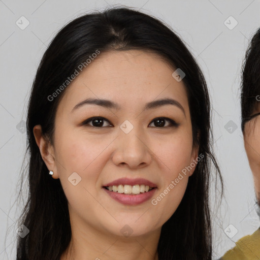 Joyful white young-adult female with long  brown hair and brown eyes