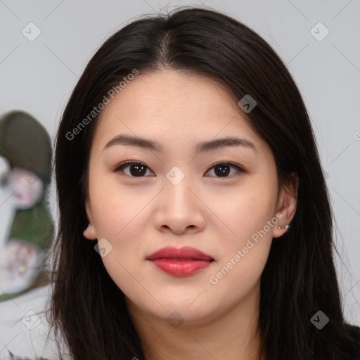 Joyful asian young-adult female with long  brown hair and brown eyes