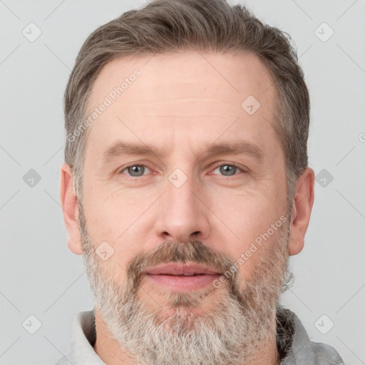 Neutral white adult male with short  brown hair and grey eyes