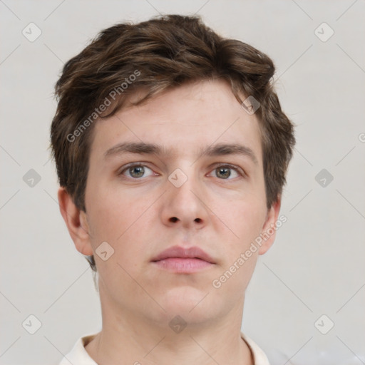 Neutral white young-adult male with short  brown hair and grey eyes