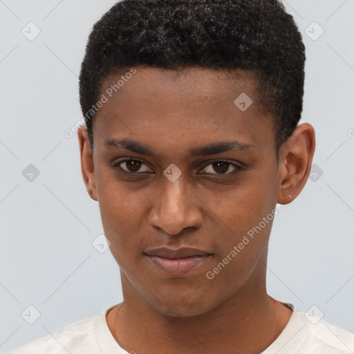 Joyful black young-adult male with short  brown hair and brown eyes