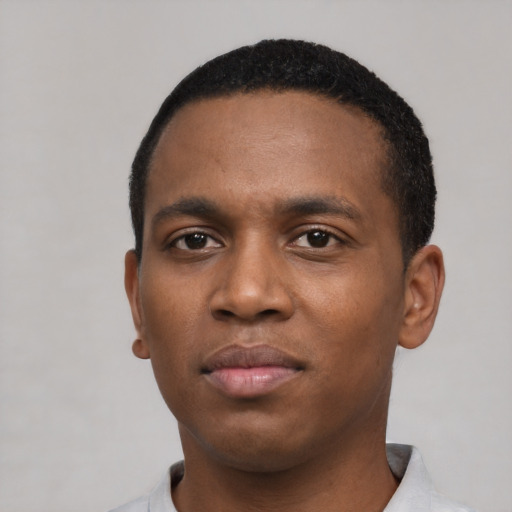 Neutral black young-adult male with short  black hair and brown eyes