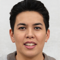 Joyful asian young-adult male with short  brown hair and brown eyes