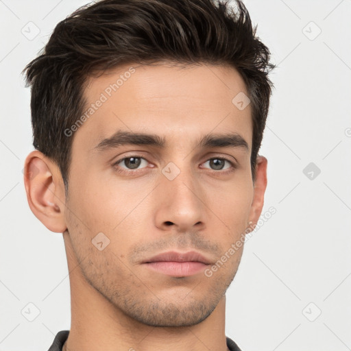 Neutral white young-adult male with short  brown hair and brown eyes