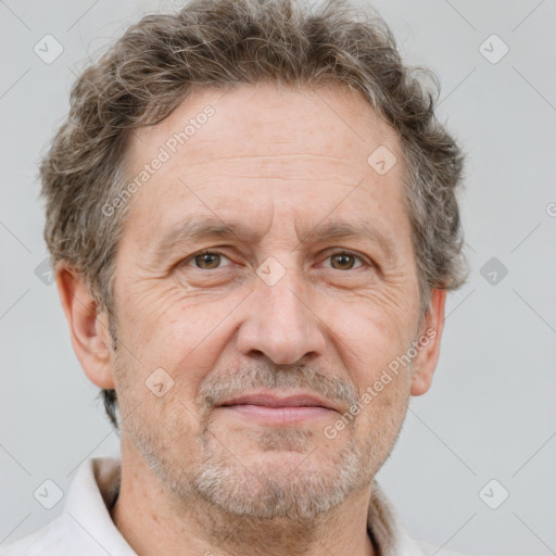 Joyful white middle-aged male with short  brown hair and brown eyes