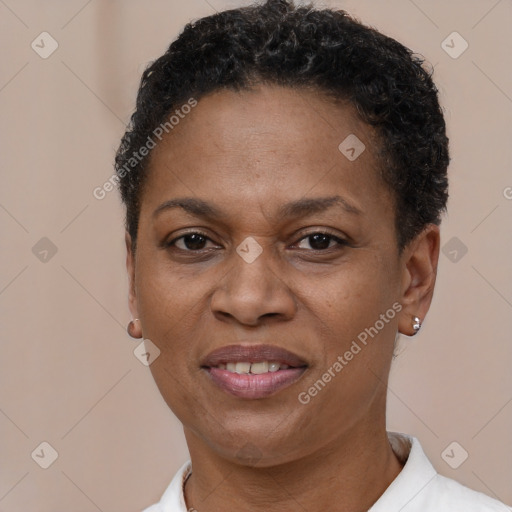 Joyful latino adult female with short  brown hair and brown eyes