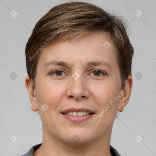 Joyful white adult female with short  brown hair and grey eyes