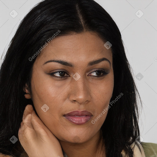 Joyful asian young-adult female with long  brown hair and brown eyes