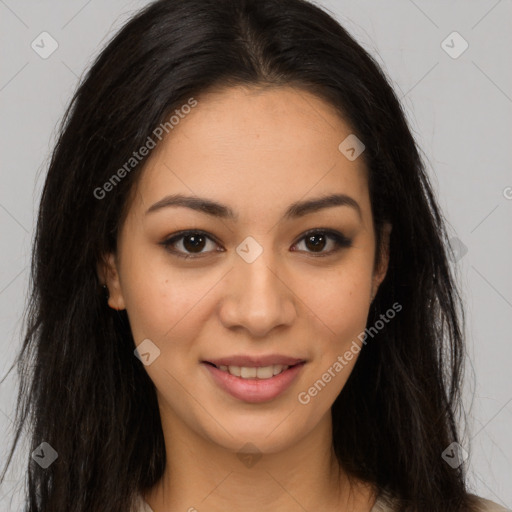 Joyful latino young-adult female with long  brown hair and brown eyes