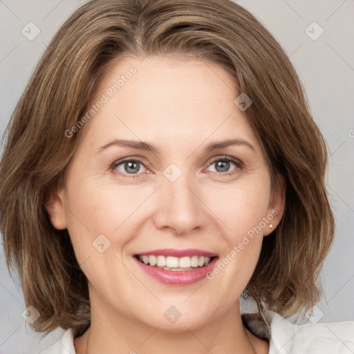 Joyful white young-adult female with medium  brown hair and green eyes