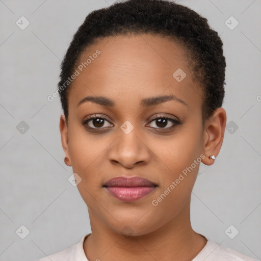 Joyful black young-adult female with short  brown hair and brown eyes