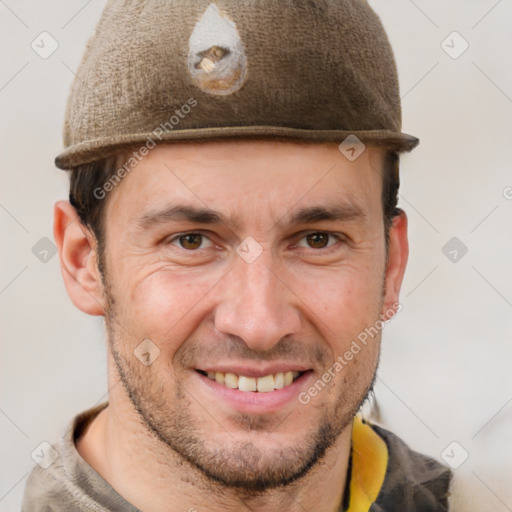 Joyful white adult male with short  brown hair and brown eyes