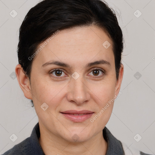 Joyful white adult female with medium  brown hair and brown eyes