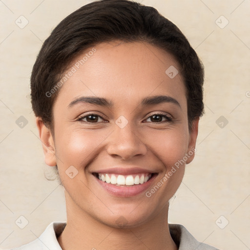 Joyful white young-adult female with short  brown hair and brown eyes