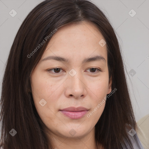 Joyful asian young-adult female with long  brown hair and brown eyes