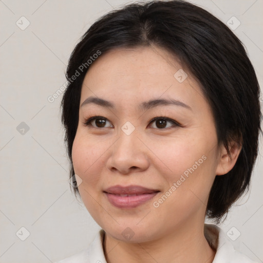 Joyful white young-adult female with medium  brown hair and brown eyes