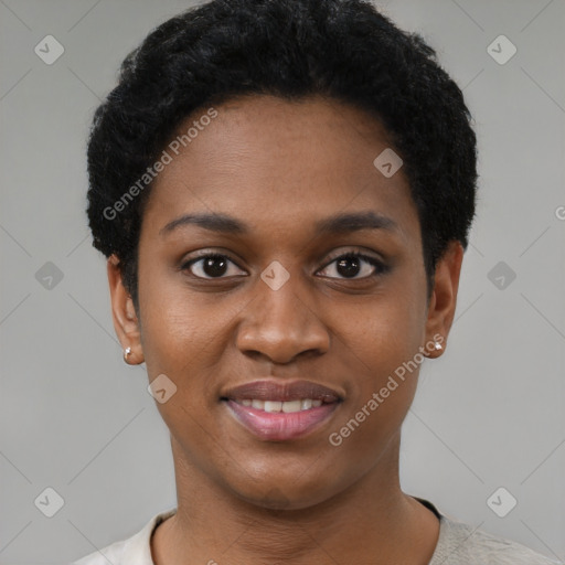 Joyful black young-adult female with short  black hair and brown eyes