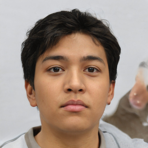 Neutral asian young-adult male with short  brown hair and brown eyes
