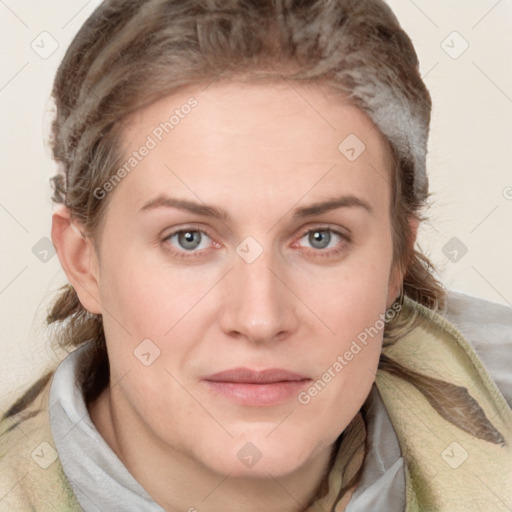 Joyful white young-adult female with medium  brown hair and blue eyes