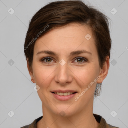 Joyful white young-adult female with short  brown hair and grey eyes