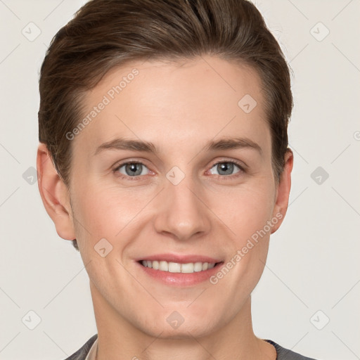 Joyful white young-adult female with short  brown hair and grey eyes