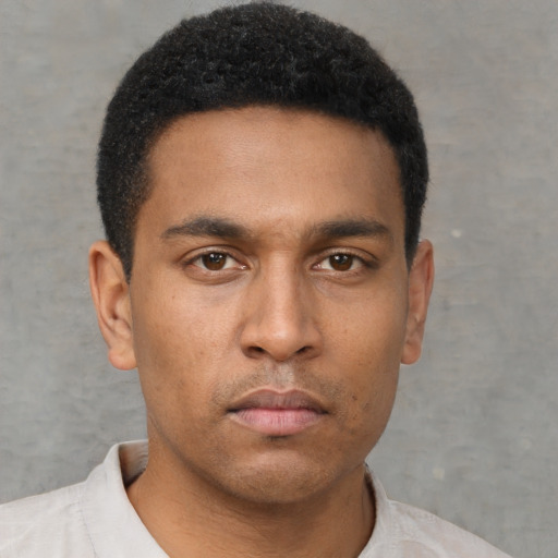 Neutral latino young-adult male with short  brown hair and brown eyes