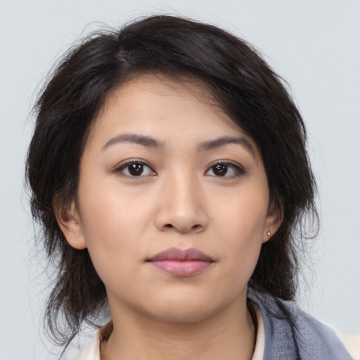 Neutral asian young-adult female with medium  brown hair and brown eyes