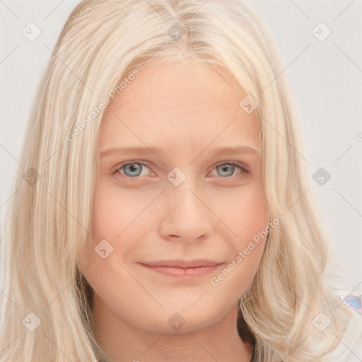 Joyful white young-adult female with long  blond hair and blue eyes