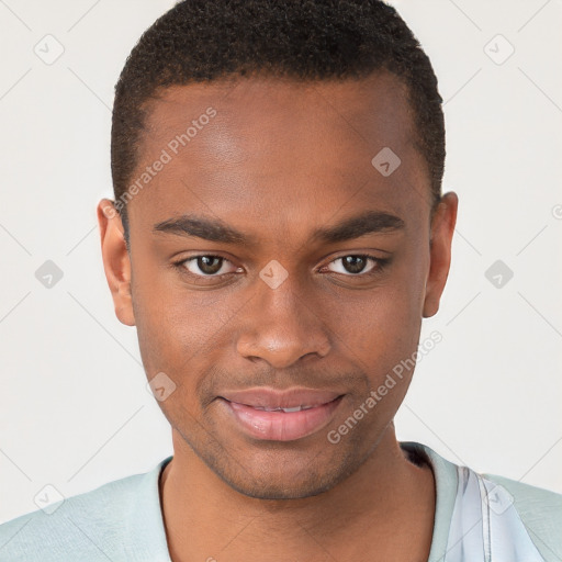 Joyful black young-adult male with short  brown hair and brown eyes