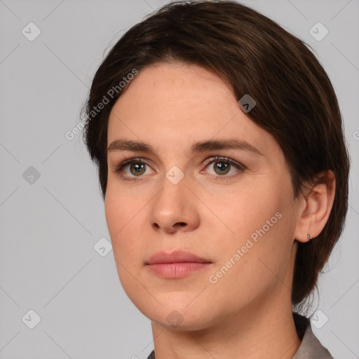 Neutral white young-adult female with medium  brown hair and brown eyes