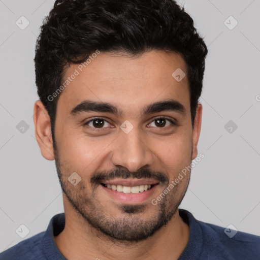 Joyful white young-adult male with short  black hair and brown eyes