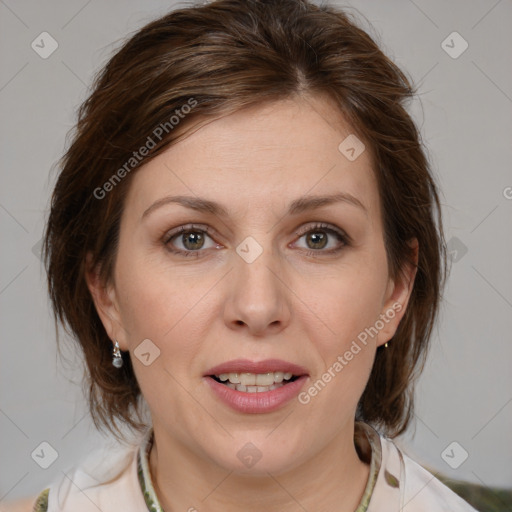 Joyful white young-adult female with medium  brown hair and blue eyes