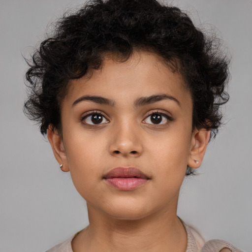 Neutral latino child female with short  brown hair and brown eyes