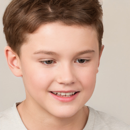 Joyful white child male with short  brown hair and brown eyes