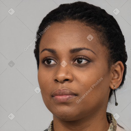 Neutral black young-adult female with short  black hair and brown eyes