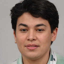 Joyful asian young-adult male with short  brown hair and brown eyes