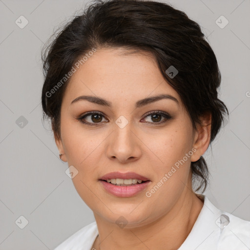 Joyful latino young-adult female with medium  brown hair and brown eyes