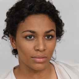 Neutral black young-adult female with short  brown hair and brown eyes