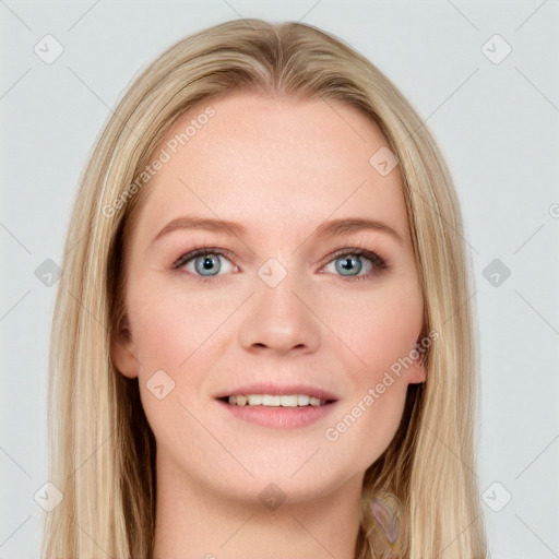 Joyful white young-adult female with long  brown hair and blue eyes