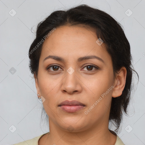 Joyful latino young-adult female with short  brown hair and brown eyes