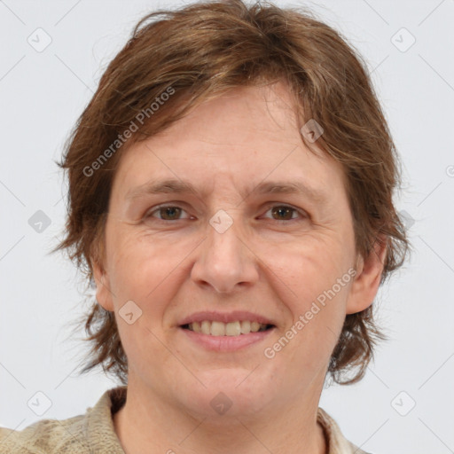 Joyful white adult female with medium  brown hair and grey eyes