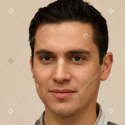 Joyful white young-adult male with short  brown hair and brown eyes